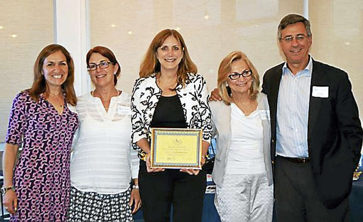 Contributed photo At center, Dr. Angela Rossbach, Principal of Warren (CT) Elementary School poses with an award given to her by the Connecticut Association for the Gifted (CAG), the 2016 ‘Educator of the Year’. With Dr. Rossbach are, from left to right, Alisa Wright, Elementary Wellness Teacher, Region 6, Laurie Sweet, Elementary Art Teacher, Region 6, Dr. Nancy Eastlake of Hartford, a member of the CAG Advisory Board, and Jon Stoner of New Canaan, CAG President. The award was given on May 10 during an annual Members Dinner held at Gusto Trattoria in Milford. Photo Courtesy of the Connecticut Association for the Gifted.