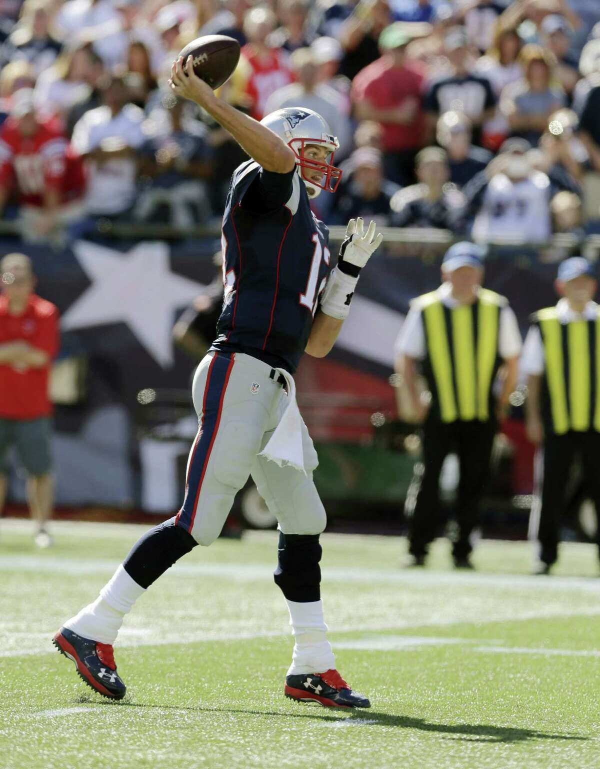 New England Patriots Tom Brady throws a pass in the first half