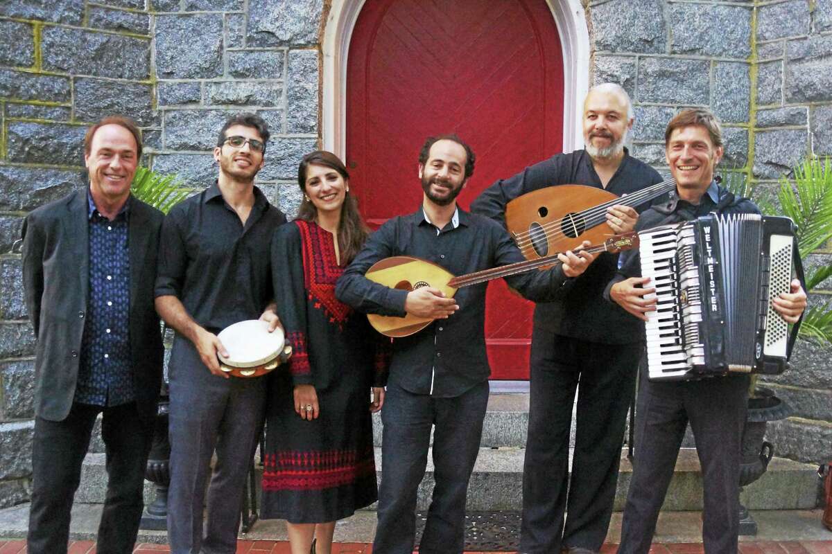 Ramzi Aburedwan, center, and the Dal’Ouna Ensemble.