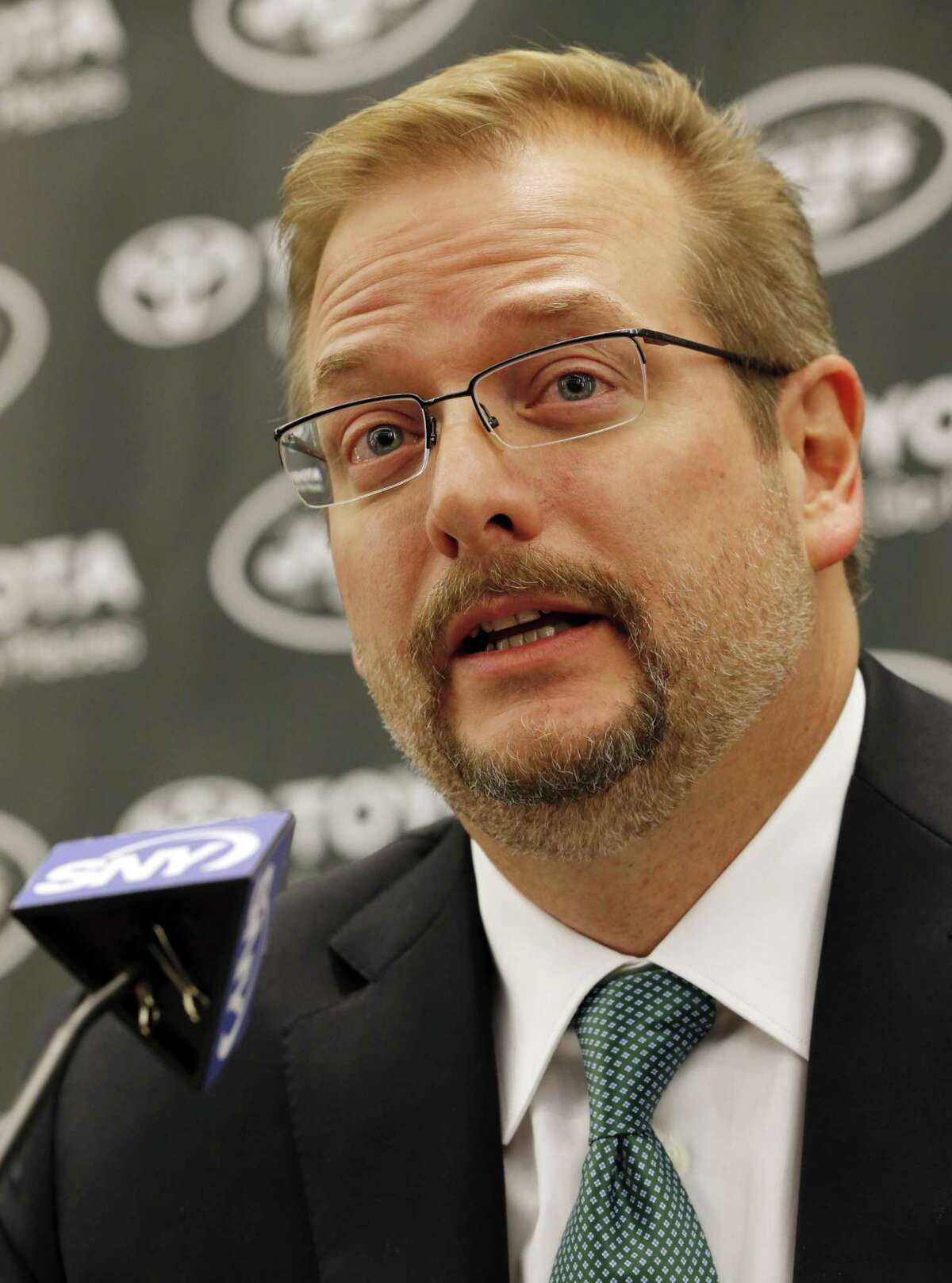 New York Jets general manager Mike Maccagnan speaks during a press conference on Jan. 21 in Florham Park, N.J.