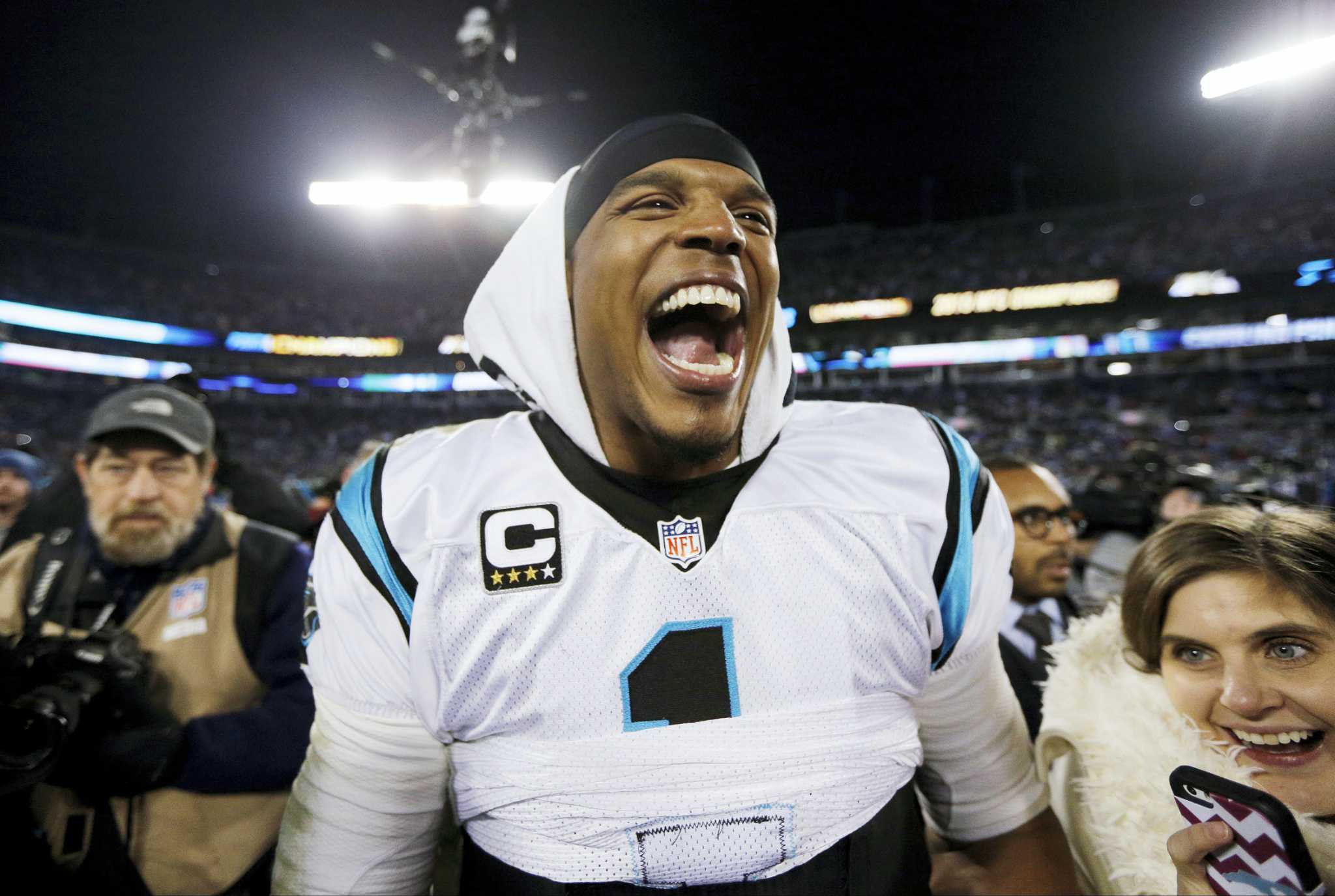 Cam Newton powers Panthers past Cardinals, into Super Bowl 50