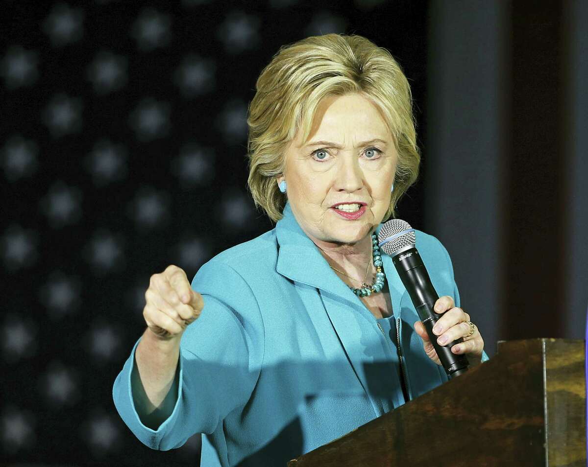 Democratic presidential candidate Hillary Clinton speaks in Commerce, Calif. A State Department audit has faulted Hillary Clinton and previous top U.S. diplomats for poorly managing information and slowly responding to new cybersecurity risks.