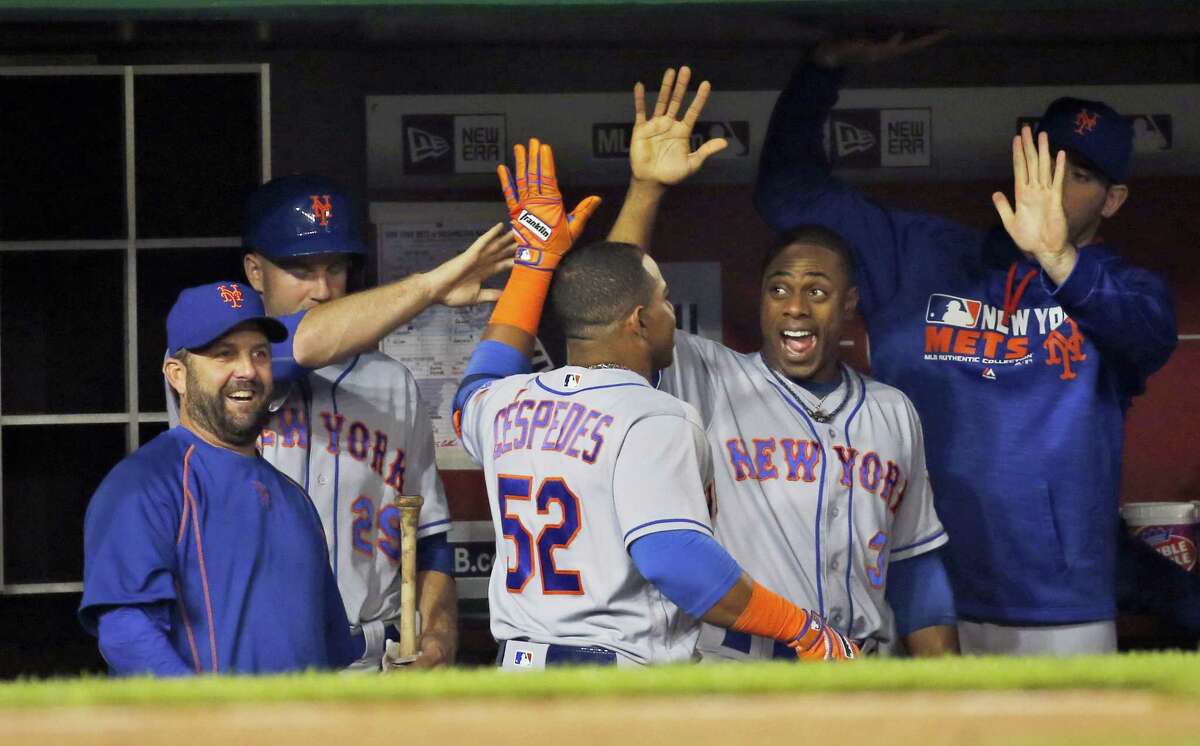Yoenis Cespedes (52) celebrates his solo home run with teammates during the fifth inning against the Nationals Monday in Washington.