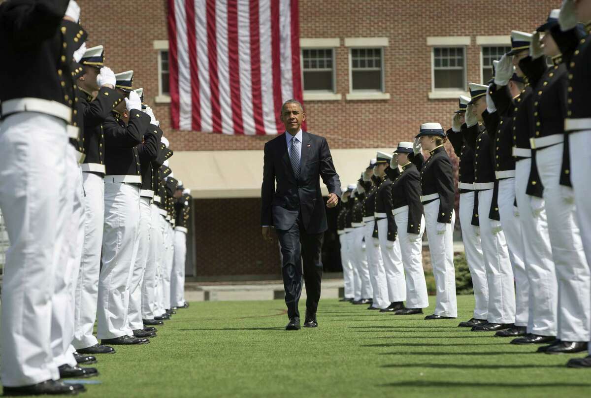 President Barack Obama is introduced at the U.S. Coast Guard Academy graduation in New London, Conn., Wednesday, May 20, 2015, before giving the commencement address.