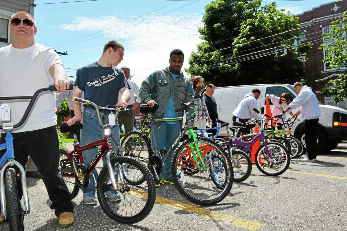 Students in LARC’s School to Community Transition Program show off donated bicycles in this file photo.