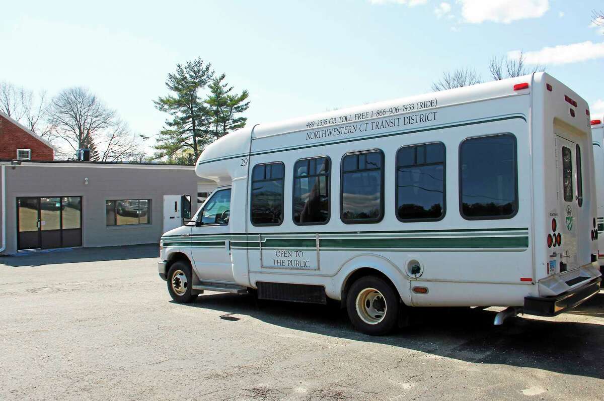 A Northwestern Connecticut Transit District bus parked outside the district’s headquarters on East Main Street in this 2014 file photo.
