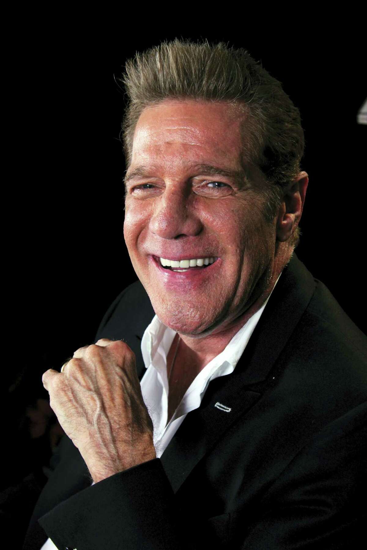 In this May 7, 2012 photo, musician Glenn Frey smiles in New York.