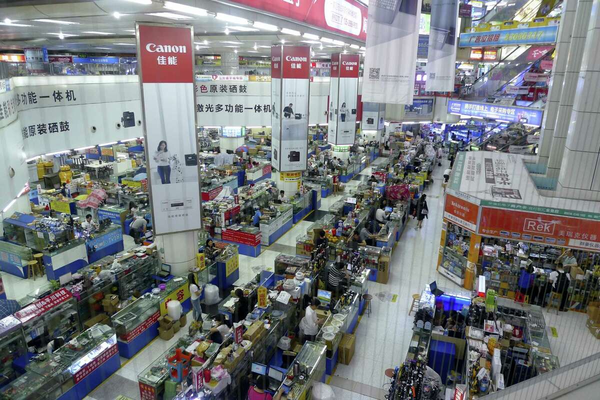 Buyers and vendors are seen at Shenzhen’s Seg electronics market, a popular place for hardware startup entrepreneurs to buy components for their inventions and prototypes in Shenzhen, China.