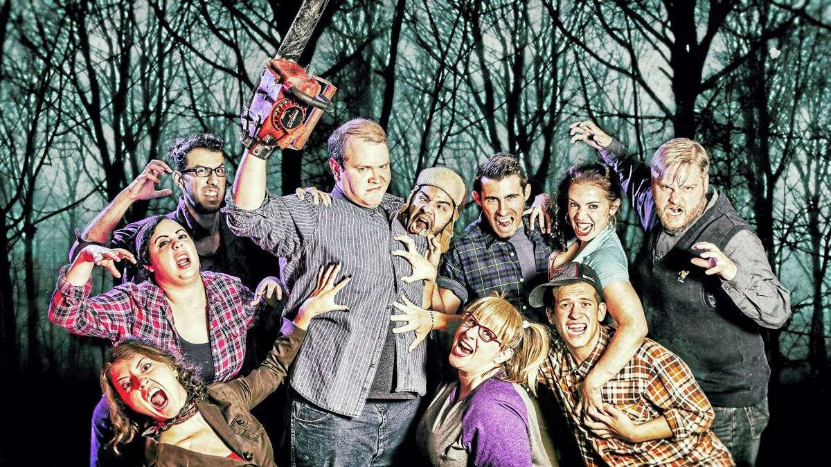 Photo by Luke Haughwøut/Mandi Martini The cast of Evil Dead: The Musical, presented by the Warner Stage Company at the Warner Theatre in Torrington, is ready to make you laugh and tremble with fear this weekend.