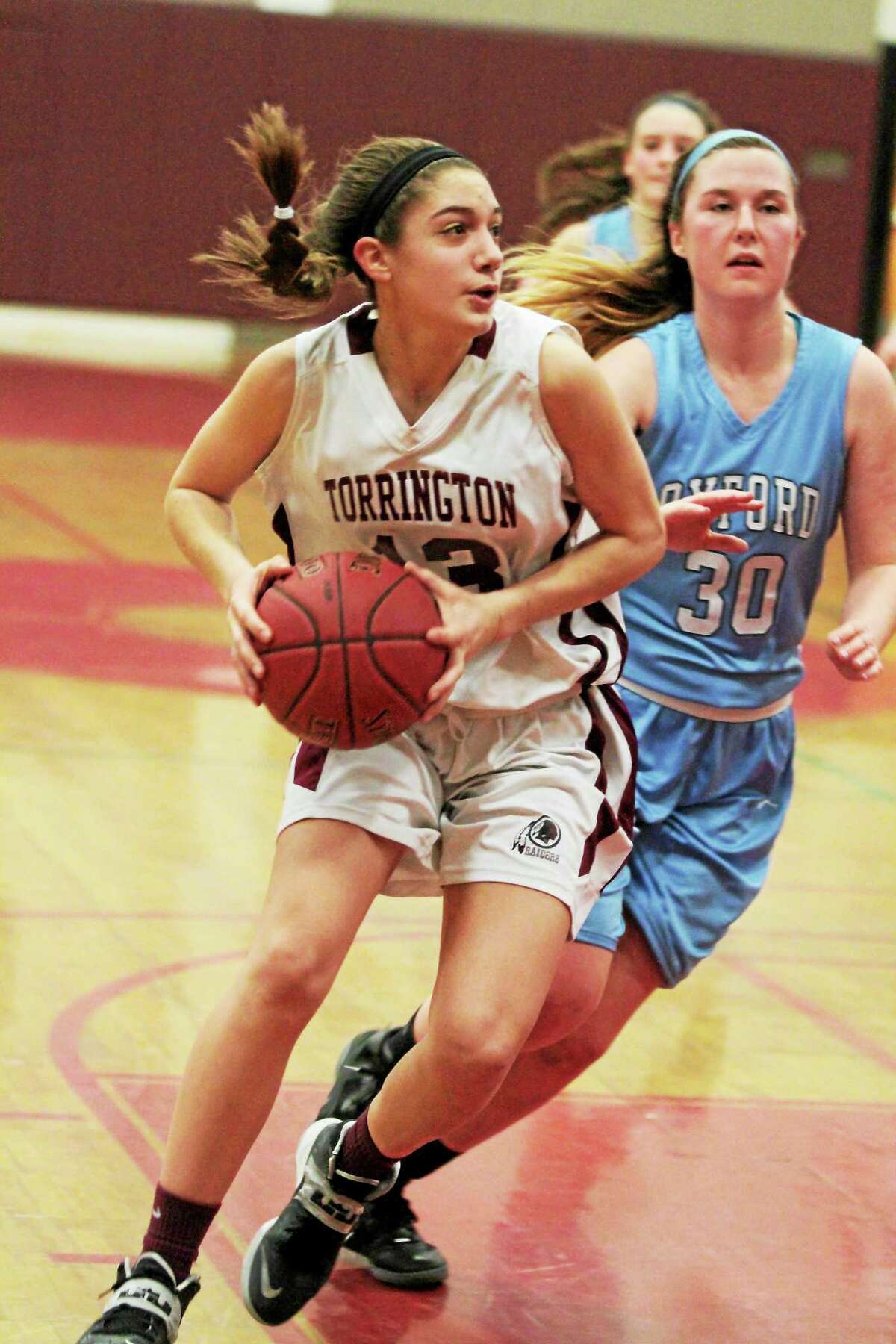 Torrington’s Brie Pergola drives to the hoop in her team’s win over Oxford Friday night.