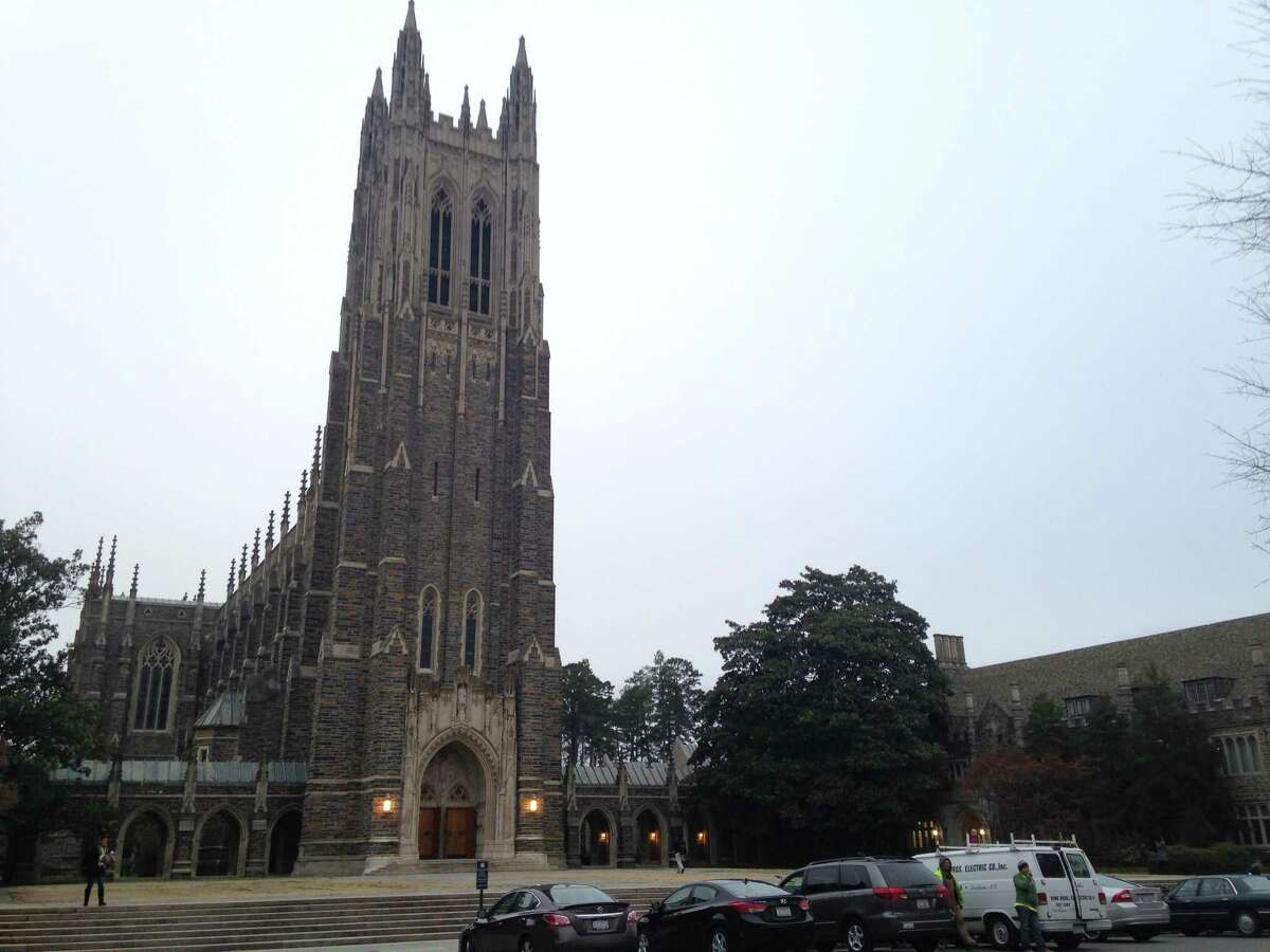 This Thursday, Jan. 15, 2015 photo shows Duke Chapel in Durham, N.C. On Thursday, just days after announcing that a traditional Muslim call to prayer would echo from the historic chapel tower, Duke University changed course after being bombarded with calls and emails objecting to the plan. Instead, Muslims will gather for their call to prayer in a grassy area in front of the chapel before heading into a room in the chapel for their weekly prayer service on Friday. (AP Photo/Jonathan Drew)