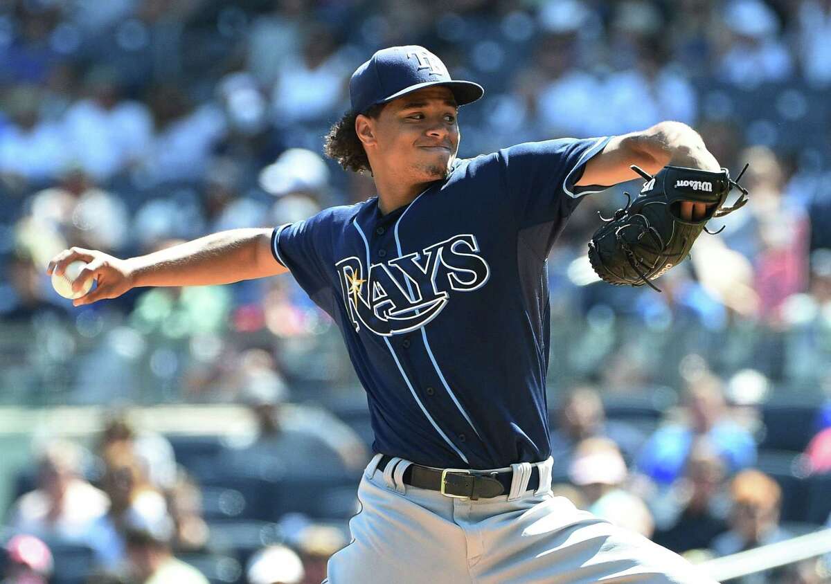 Rays starter Chris Archer delivers a pitch against the Yankees during the first inning on Sunday.