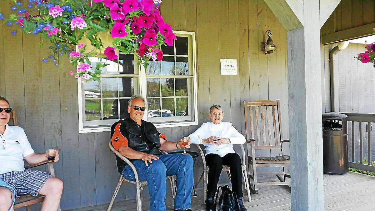 N.F. Ambery photo Visitors Mark Simiola and mother Nora Valery, both of Bristol, enjoy the porch at Sunset Meadow.