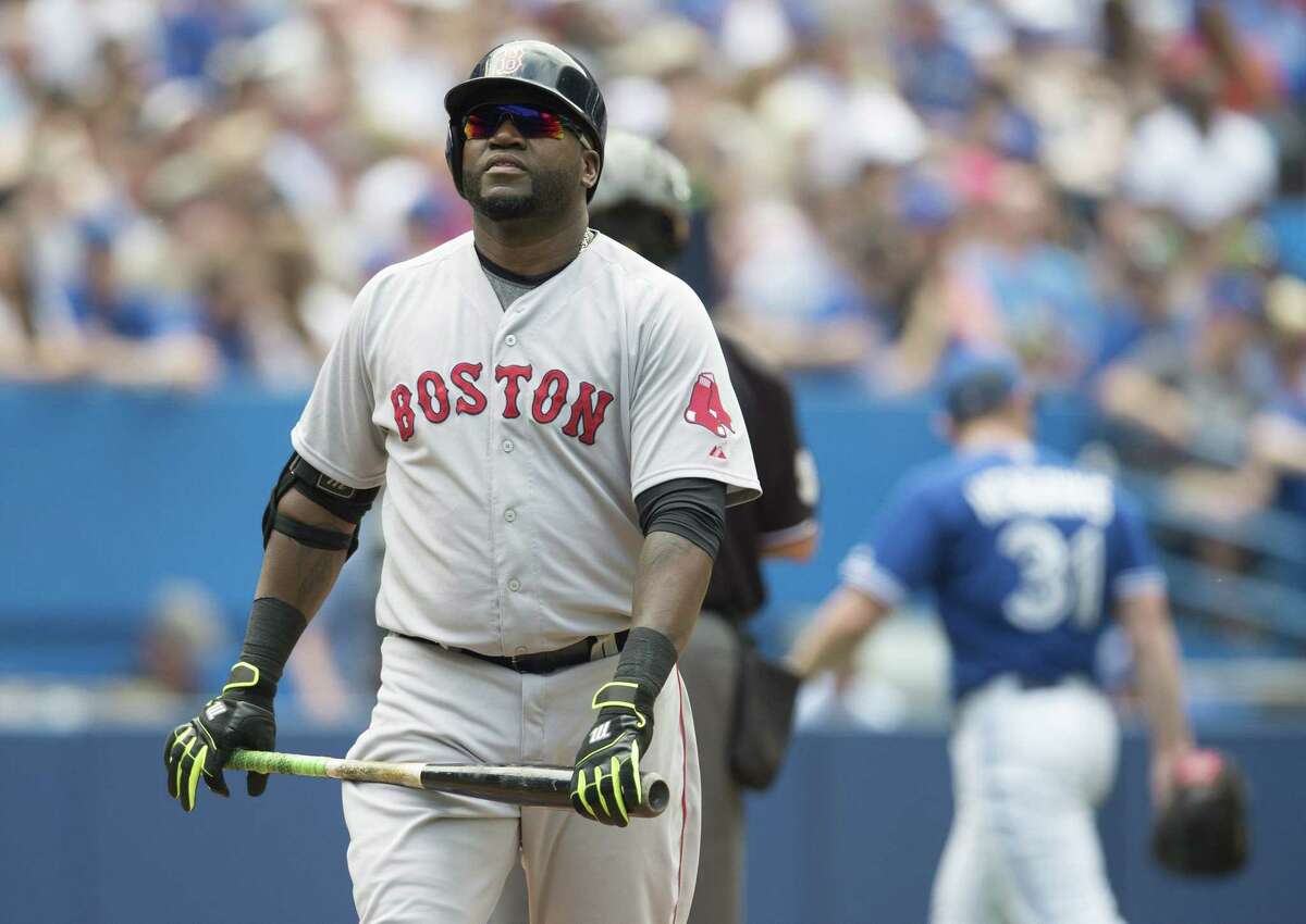 Boston Red Sox DH David Ortiz reacts after popping out to third base during the seventh inning of Saturday’s loss to the Blue Jays in Toronto.