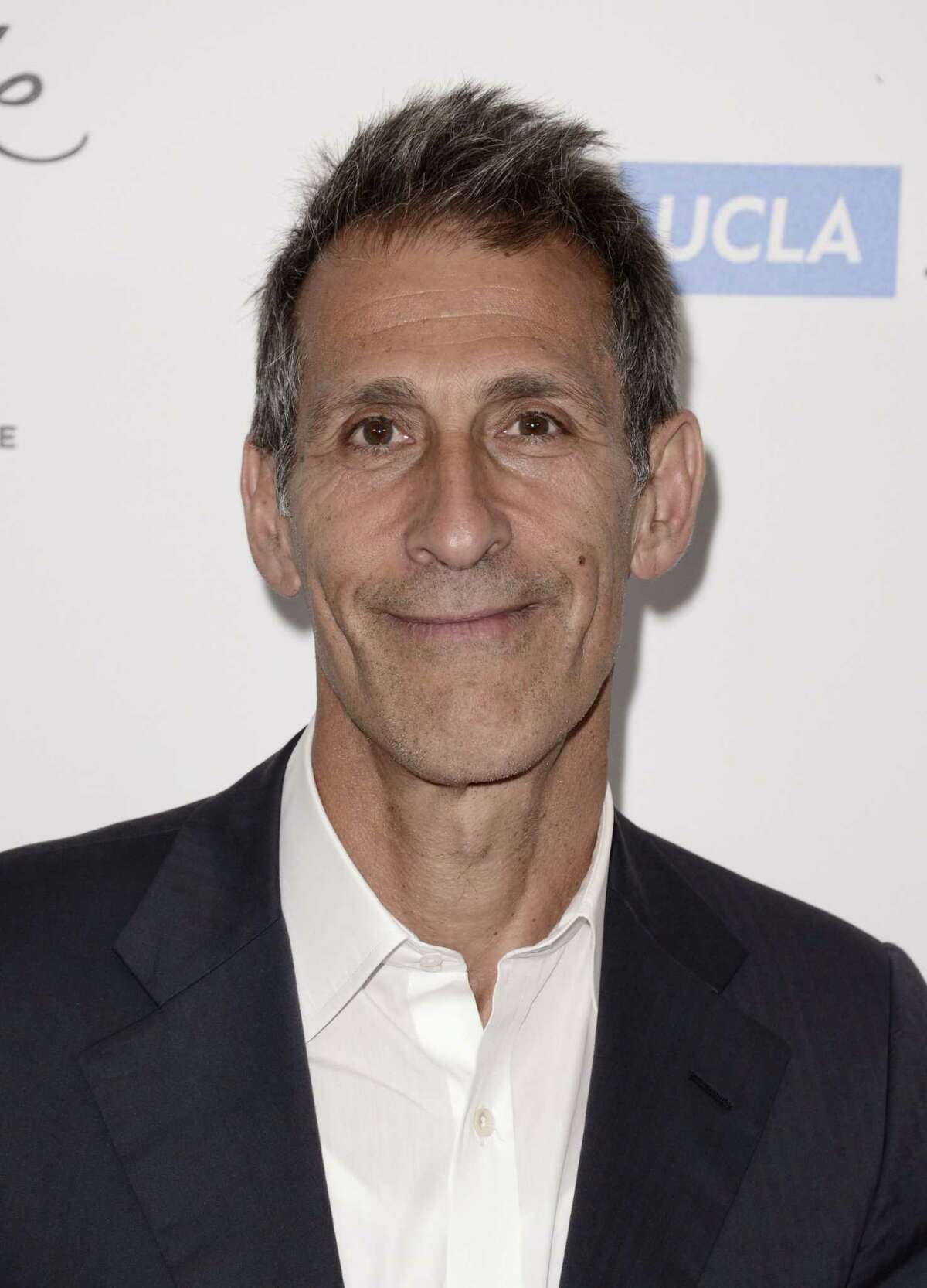 FILE - In this April 25, 2014 file photo, Michael Lynton, chairman and CEO, Sony Pictures Entertainment, arrives at the 19th annual "Taste For A Cure" at the Beverly Wilshire Hotel, in Beverly Hills, Calif. More than six weeks after hackers attacked Sony Pictures Entertainment, its computer network is still down but the studio has not lost a single day of production on any of its films or television, Lynton told The Associated Press on Thursday, Jan. 8, 2015. In a wide-ranging interview Lynton talked about the companyís isolation and the uncertainty that was created by the pre-Thanksgiving attack, which the U.S. government has attributed to North Korea. (Photo by Dan Steinberg/Invision/AP, File)