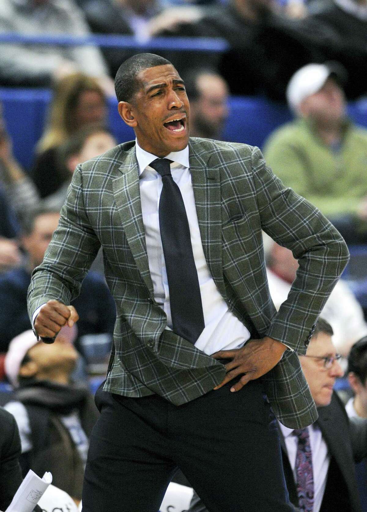 UConn coach Kevin Ollie reacts during Tuesday’s loss to Temple in Hartford.