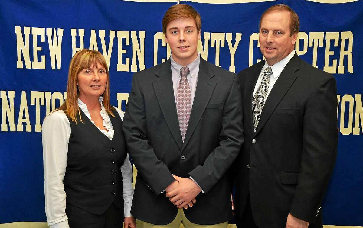Sean Marinan, center, played for his father at Xavier High and his mother loves UConn. Add it all up and the junior walk-on is now making an immediate impact with the Huskies.