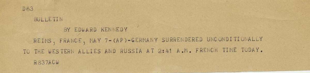 This undated photograph shows the news bulletin sent by Associated Press Paris Bureau Chief Edward Kennedy announcing the unconditional surrender of the Germans to the Allies on May 7, 1945.