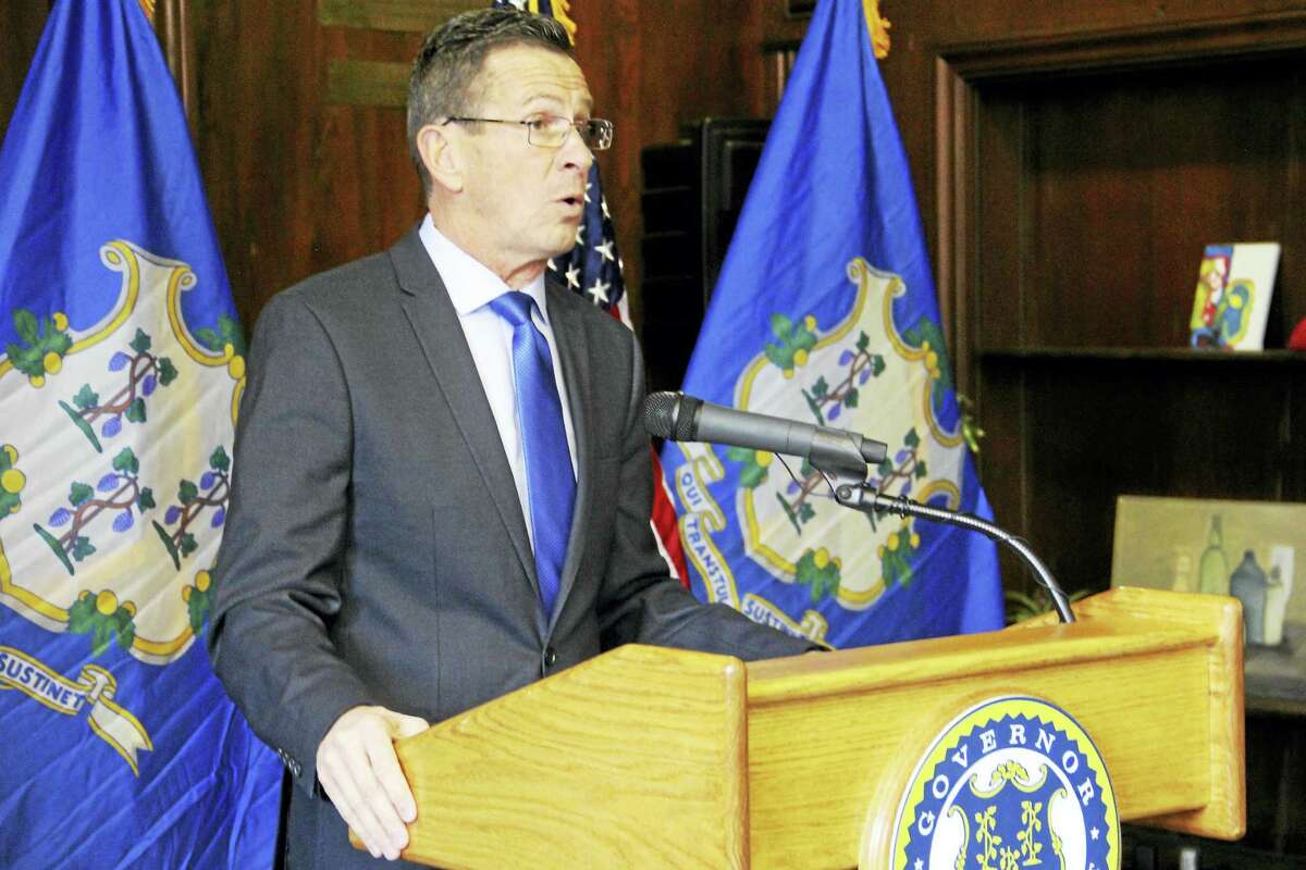 Connecticut Gov. Dannel P. Malloy speaks during a press conference Friday in New Haven.