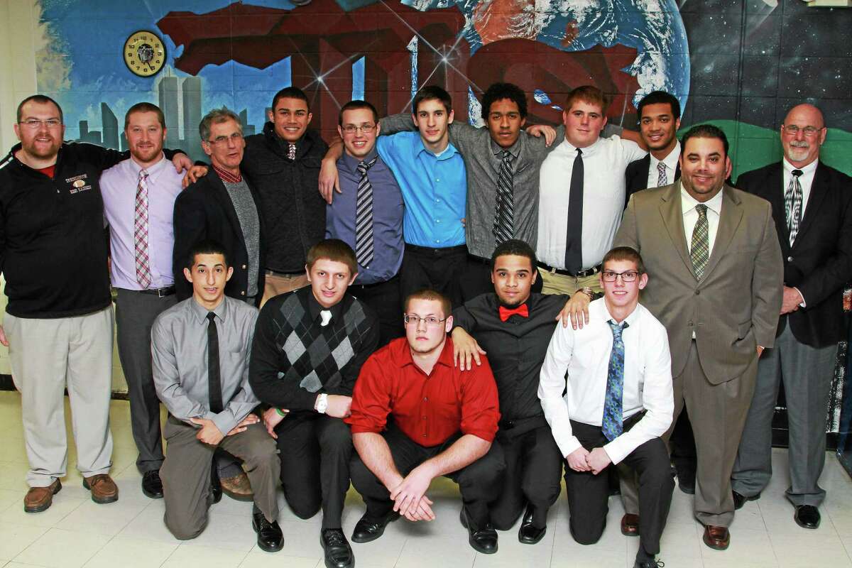 Torrington seniors and coaches at the Red Raidersí football banquet are front row, left to right: Dylan Rodriguez; Anthony Pandolfo; Mike Montanez; Frank Perry; P.J. Killmartin. Back row, left to right: Coach Andy Therriault; Coach Jordan Capitanio; Coach Bob Reynolds; Bryan Rocha; Dylan Heller; Adam Klebe; Ludi Perez; Ben Bonvicini; Manny Rijo; Head Coach Gaitan Rodriguez; Coach Don Whitley.