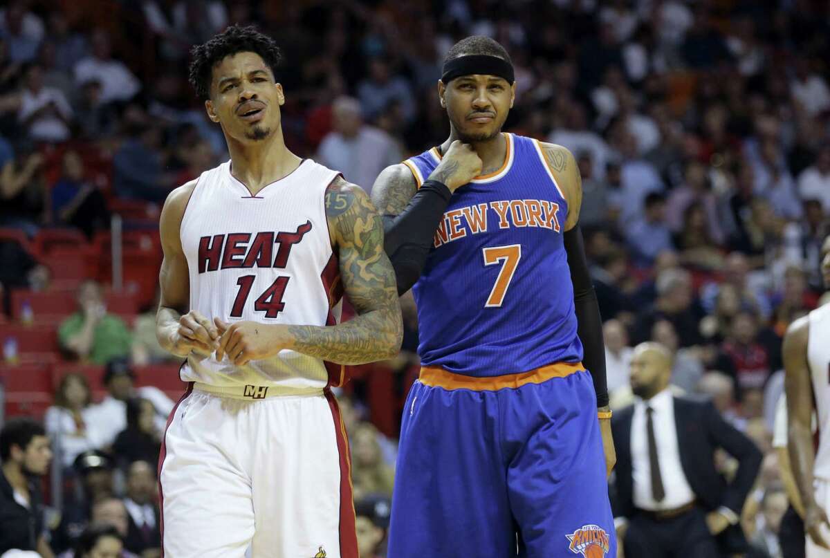 Miami Heat's Gerald Green (14) reacts after being called for a foul against New York Knicks' Carmelo Anthony (7) during the first half of an NBA basketball game, Wednesday, Jan. 6, 2016, in Miami. (AP Photo/Lynne Sladky)