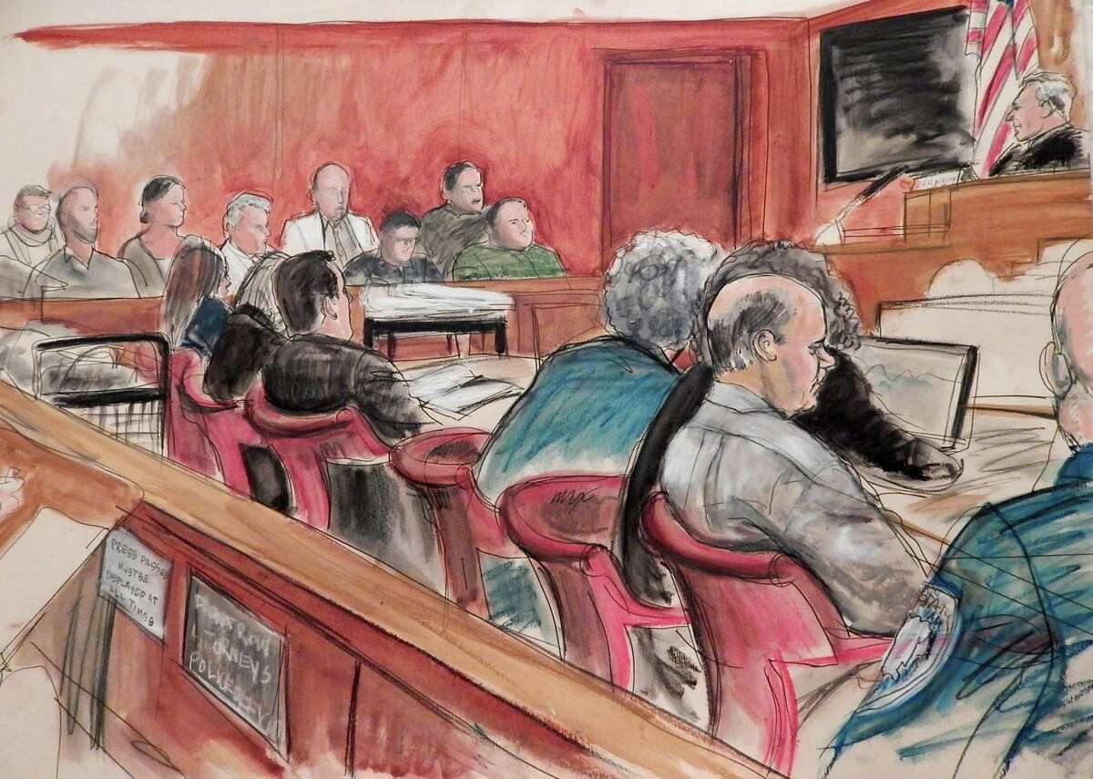 In this April 27, 2015 courtroom sketch, defendant Pedro Hernandez, in profile at right, sits at a table with his defense team as Judge Maxwell Wiley, upper right, addresses the jury, in background, in Manhattan state Supreme Court, where Hernandez is on trial in New York in the case of missing first-grader Etan Patz who disappeared four decades ago on his way to school. Fifteen days into their deliberations, jurors have twice said they can't reach a unanimous verdict and have been told to keep trying. They are weighing murder and kidnapping charges against Hernandez, 54, who confessed three years ago to killing 6-year-old Etan in 1979; his lawyers say his confession was imaginary and another suspect is the more likely killer. Harvey Fishbein, lead defense attorney, is in blue suit at center of table. (AP Photo/Elizabeth Williams)