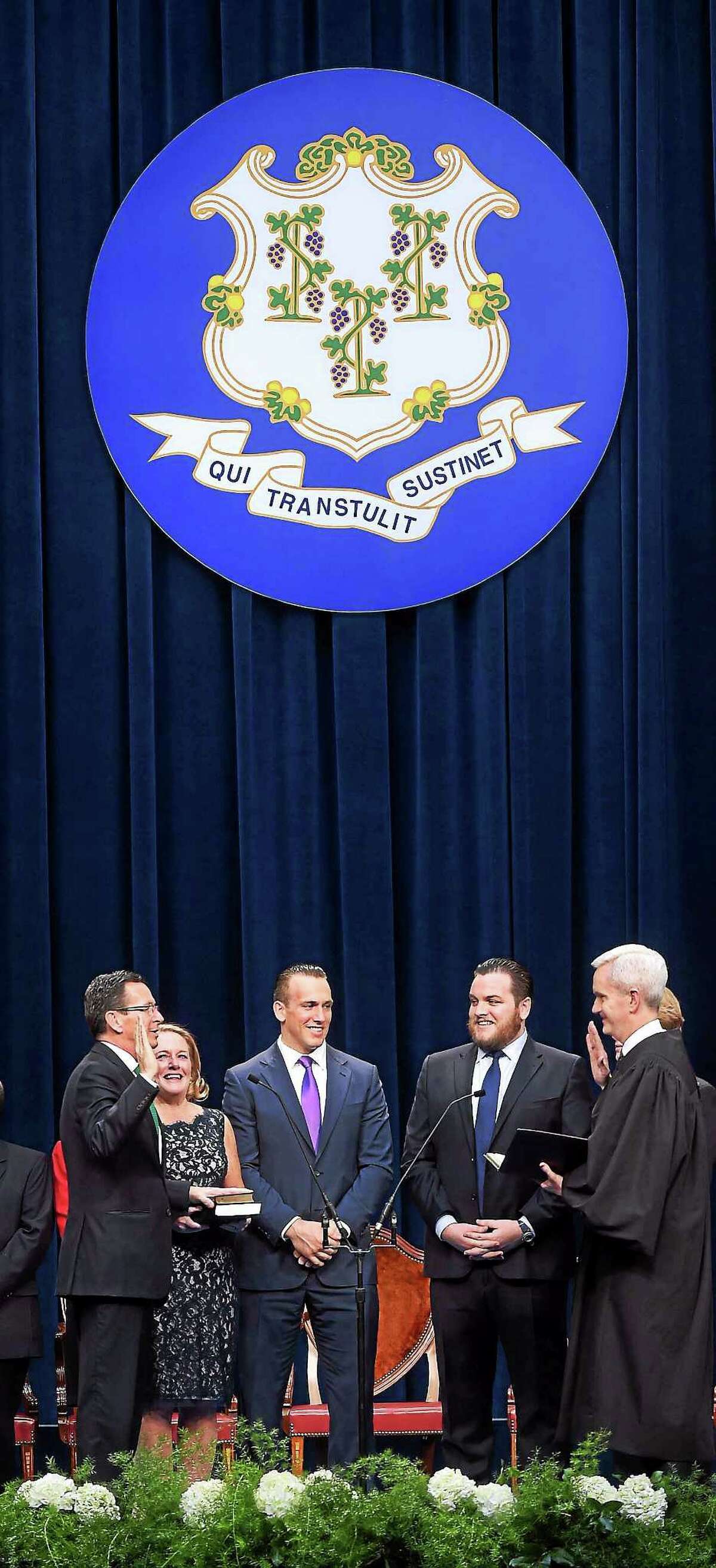 Governor Dannel P. Malloy (left) is sworn into office by Connecticut Supreme Court Justice Andrew J. McDonald (right) in the William A. O’Neill State Armory in Hartford on January 7, 2015.