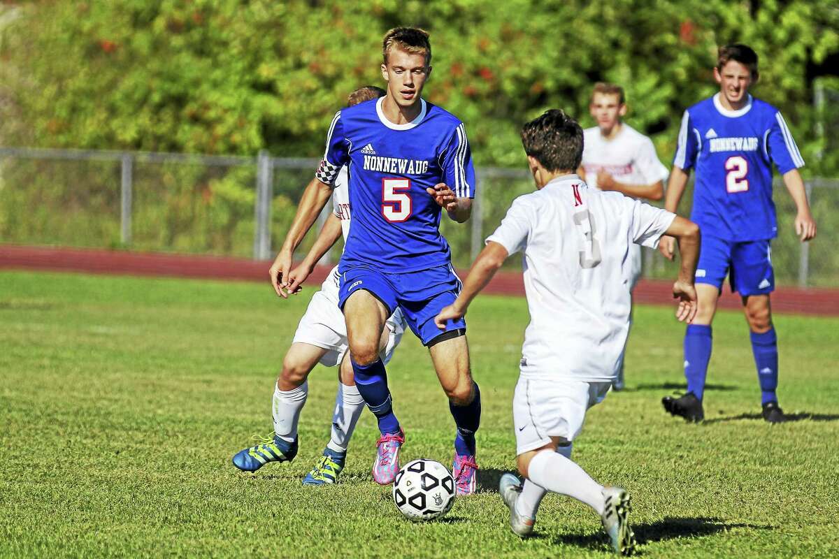 Nonnewaug striker Leland Malloy had the first goal at Northwestern Tuesday afternoon, thanks, in part, to great midfield work by Dan Swanson (2).