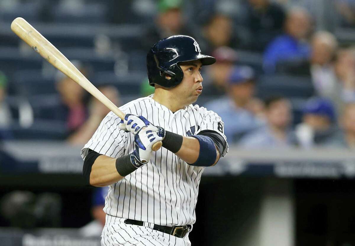 New York Yankees Carlos Beltran reacts as he watches his third-inning, solo, home run off Kansas City Royals starting pitcher Chris Young in a baseball game at Yankee Stadium in New York Monday.