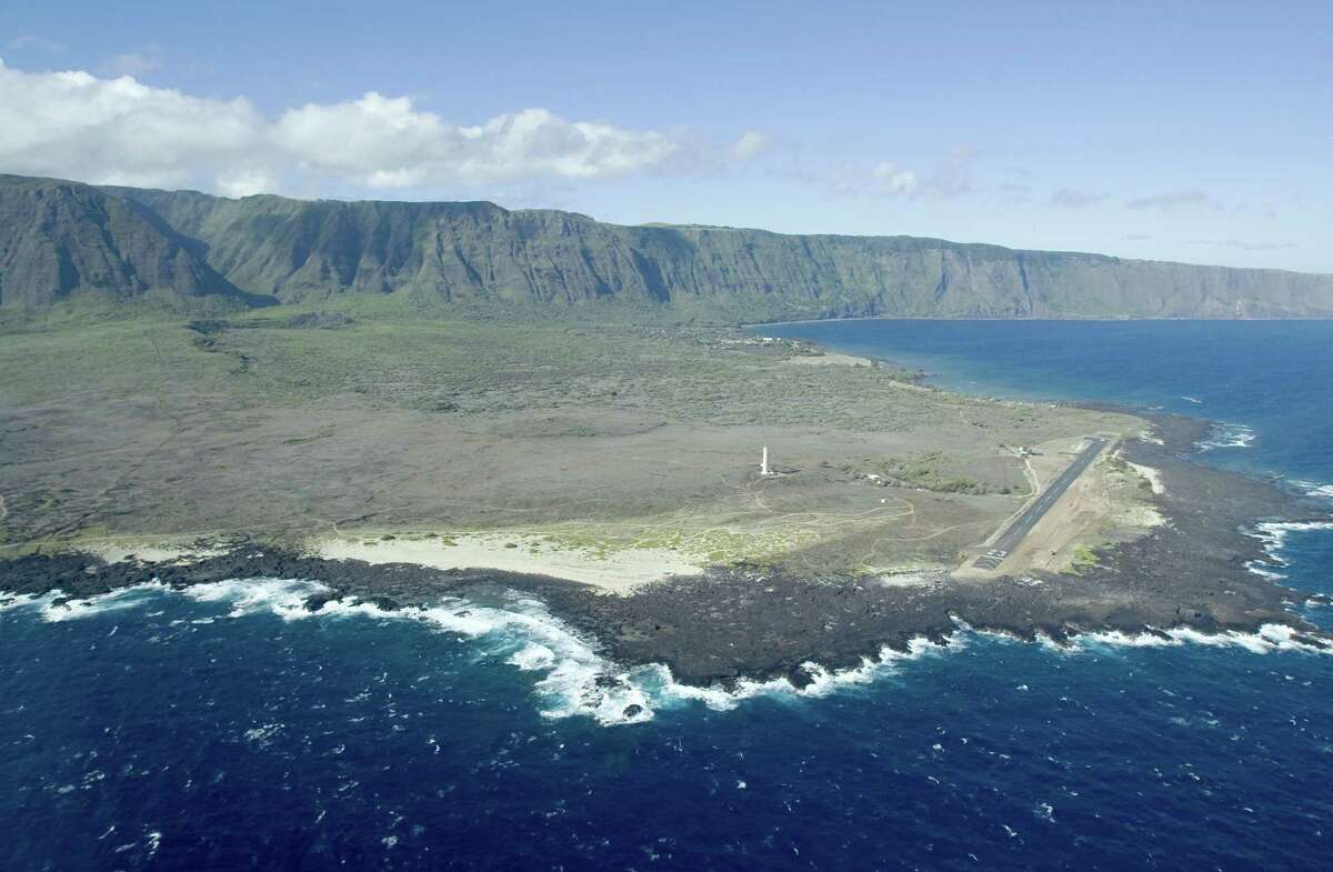 FILE -This Aug. 12, 2008, file photo, shows an aerial view of Kalaupapa Peninsula on Molokai, Hawaii. A handful of people with leprosy are still living full time on the isolated peninsula, but the National Park Service is already making plans to overhaul buildings and allow more visitors to the area when the last of the patients dies.