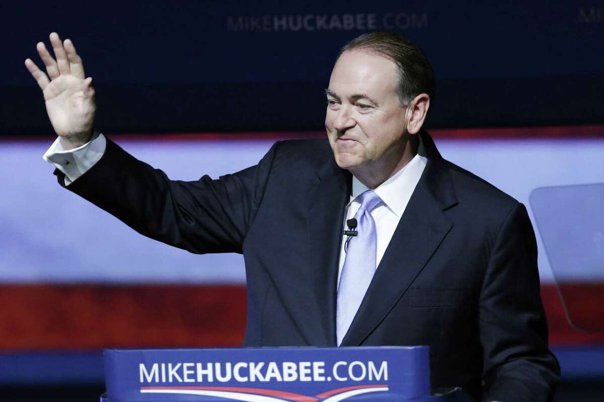 Former Arkansas Gov. Mike Huckabee waves to supporters in Hope, Ark., Tuesday, May 5, 2015, after he announced that he is running for the Republican presidential nomination. Huckabee pitched himself as the best GOP candidate to take on Democratic favorite Hillary Rodham Clinton.