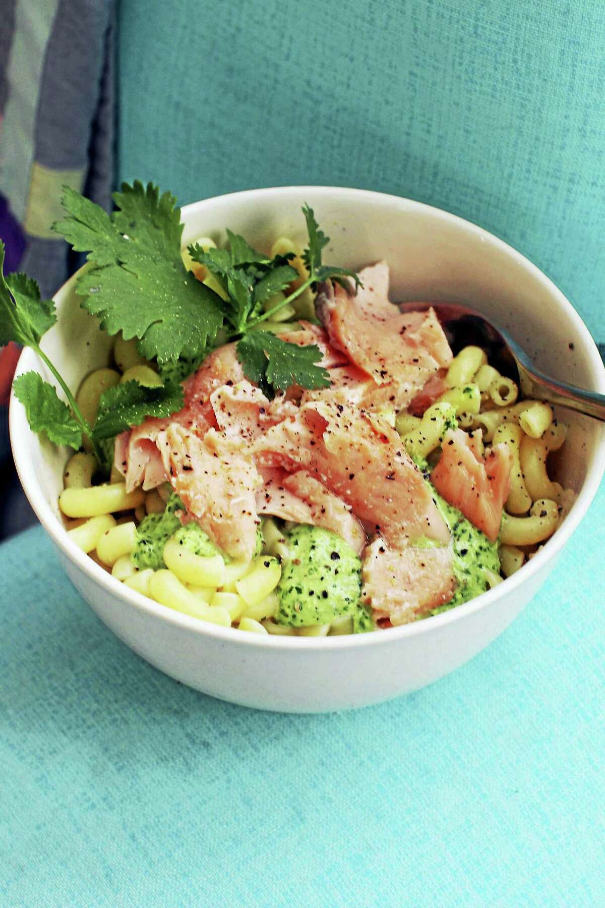 This delicious spring dish is easy to assemble and travels well, making it perfect for packed lunches and picnics. It also can be prepped in advance by poaching the fish and cooking the pasta the night before.