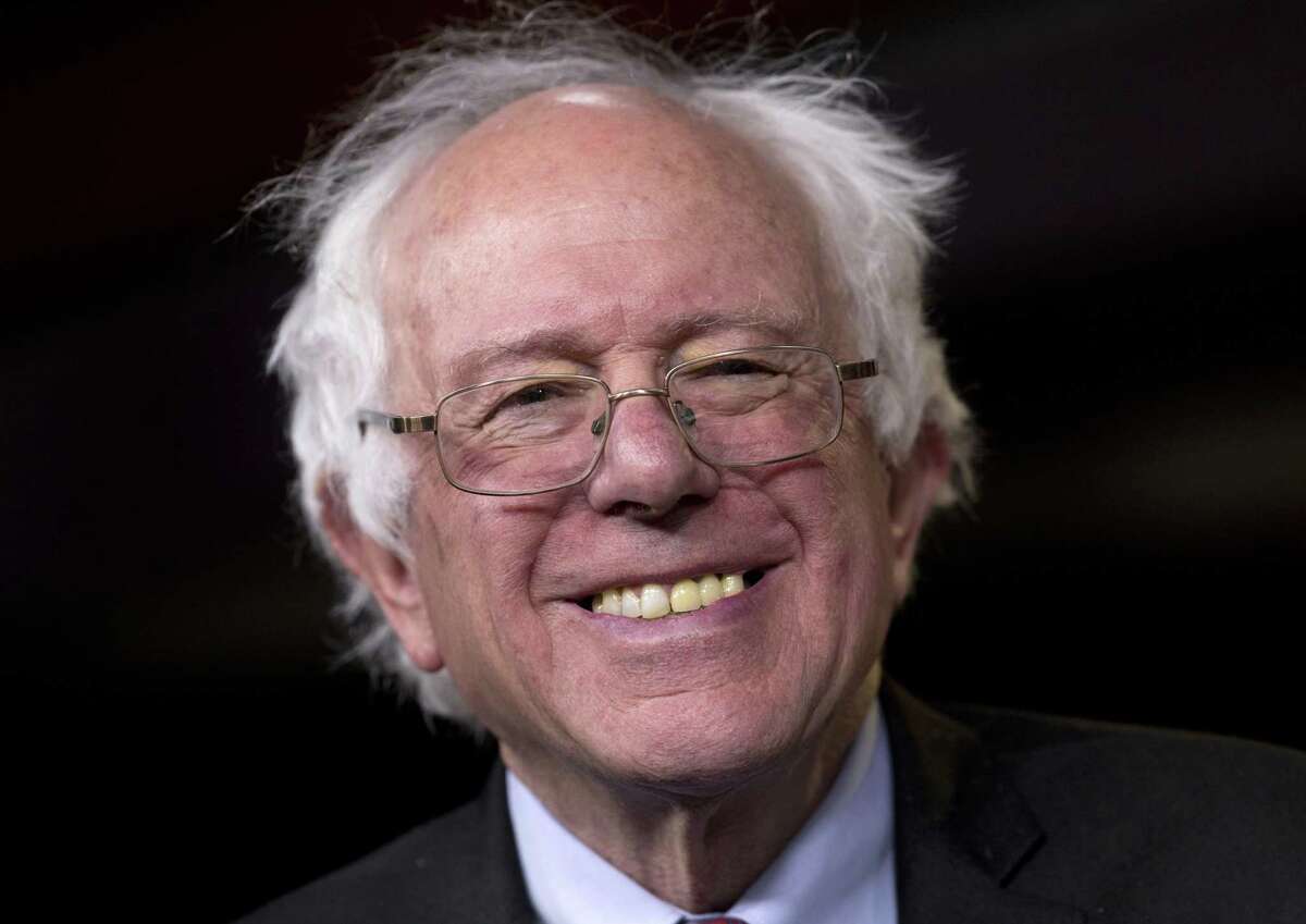 Sen. Bernie Sanders, I-Vt., smiles as he is asked about running for president during a news conference on Capitol Hill in Washington on April 29.