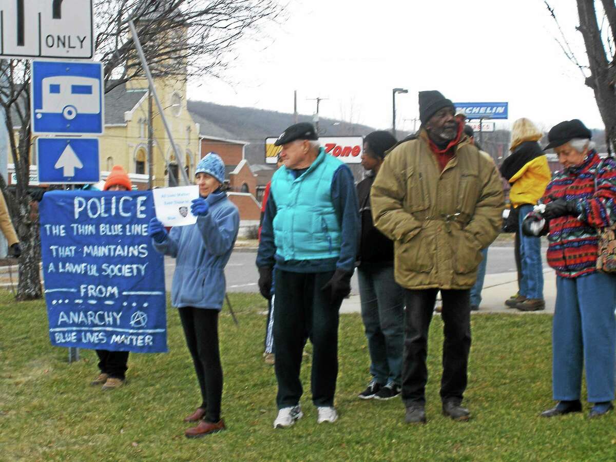 A crowd of supporters outside the Torrington Police Department show their appreciation for officers. Photo by Stephen Underwood