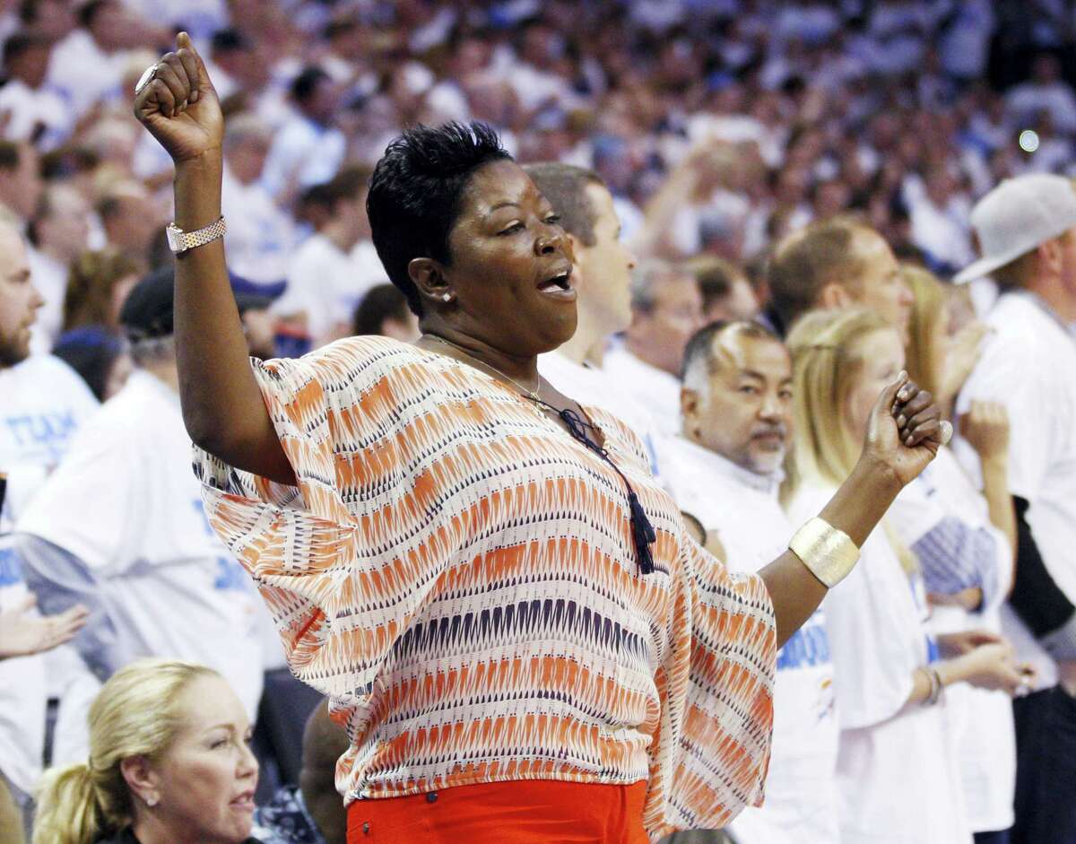 In this 2012 file photo, Kevin Durant’s mother, Wanda Pratt, dances on the sidelines during a playoff game. Pratt is the subject of a Lifetime original movie called The Real MVP: The Wanda Durant Story.