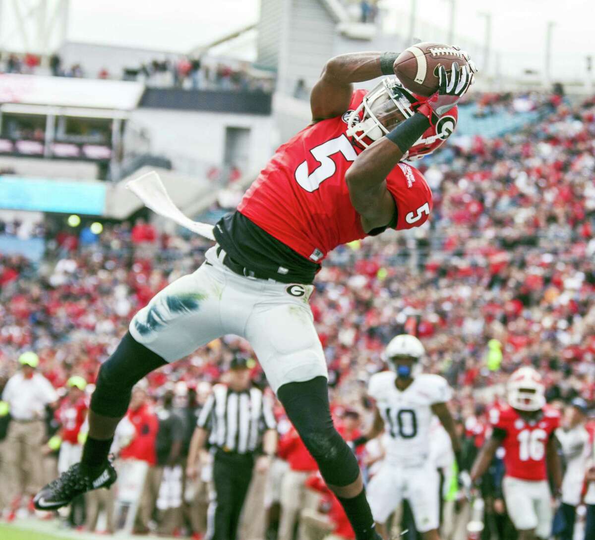 Georgia wide receiver Terry Godwin catches a touchdown during the first half of the TaxSlayer Bowl against Penn State on Saturday in Jacksonville, Fla.