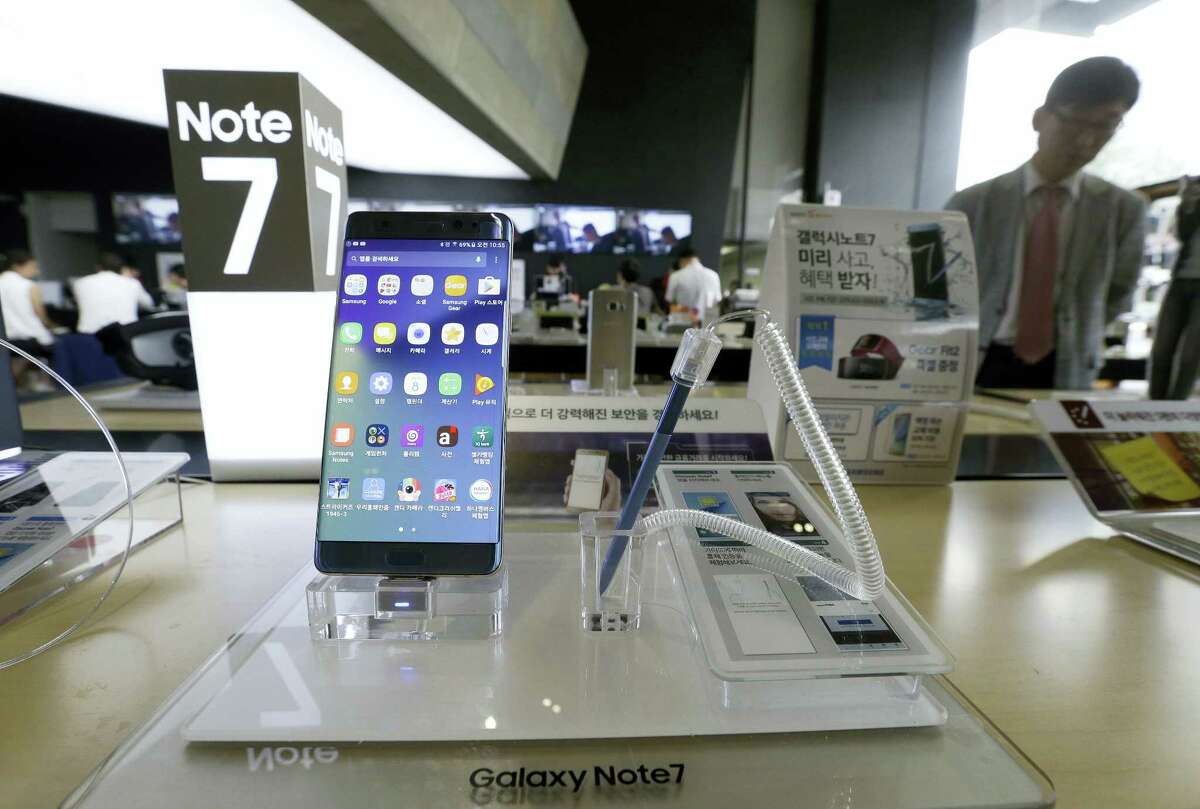 In this Sept. 8, 2016 photo, a Samsung Electronics’ Galaxy Note 7 smartphone is displayed at the headquarters of South Korean mobile carrier KT in Seoul, South Korea. Samsung Electronics recommended South Korean customers to stop using the new Galaxy Note 7 smartphones, which the company is recalling worldwide after several dozen of them caught fire.