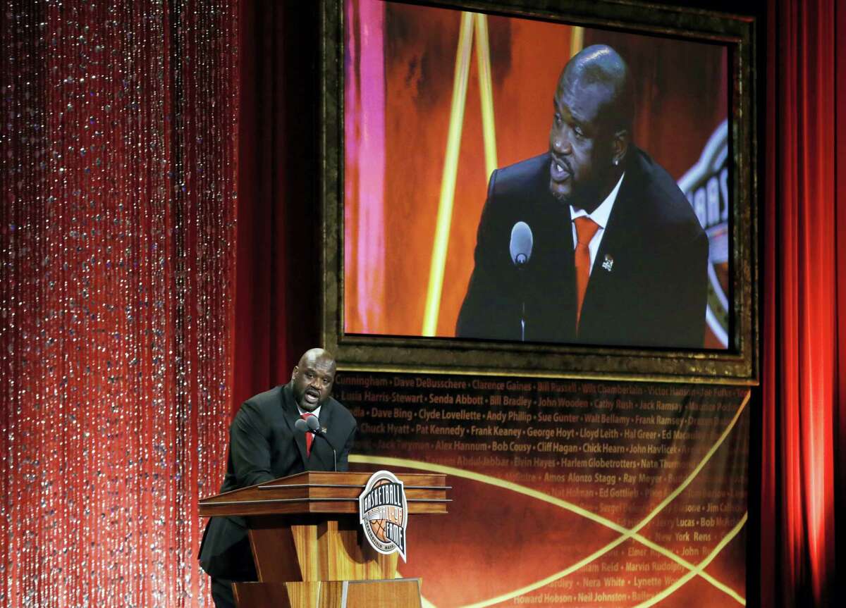 Hall of Fame inductee Shaquille O’Neal speaks during the ceremony on Friday in Springfield, Mass.