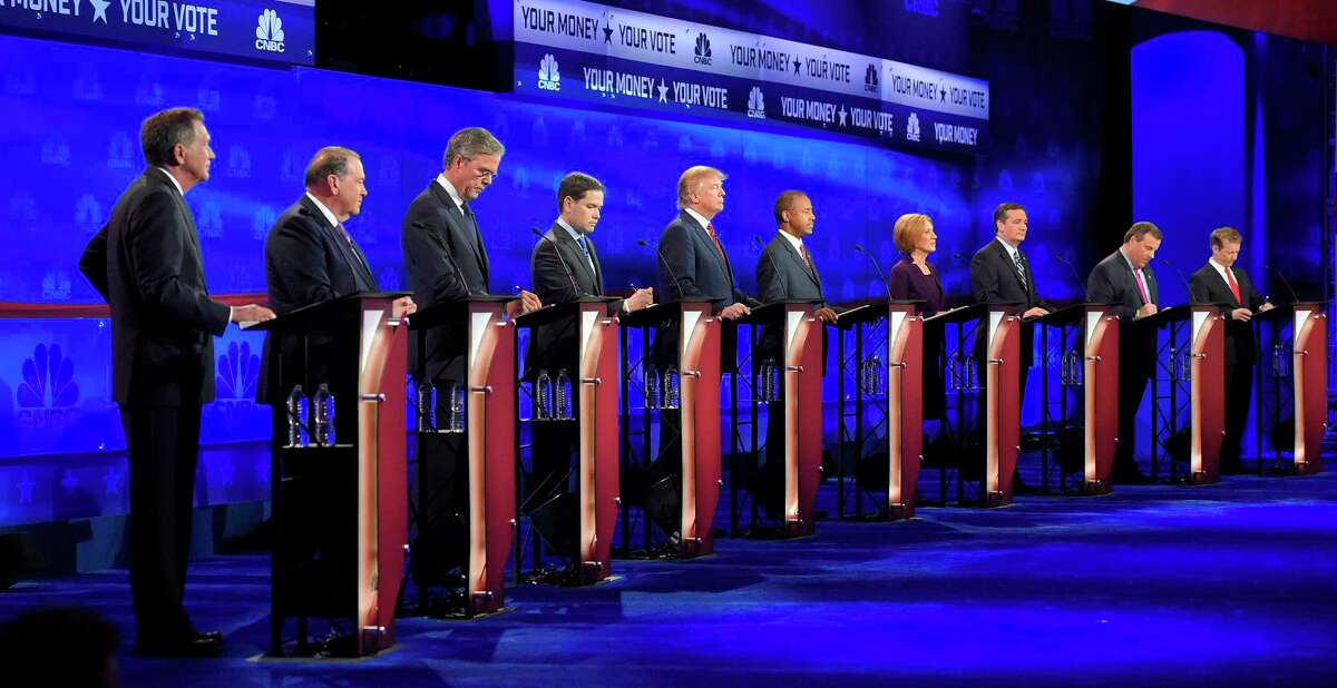 Republican presidential candidates, from left, John Kasich, Mike Huckabee, Jeb Bush, Marco Rubio, Donald Trump, Ben Carson, Carly Fiorina, Ted Cruz, Chris Christie, and Rand Paul take the stage during the CNBC Republican presidential debate at the University of Colorado, Wednesday, Oct. 28, 2015, in Boulder, Colo.