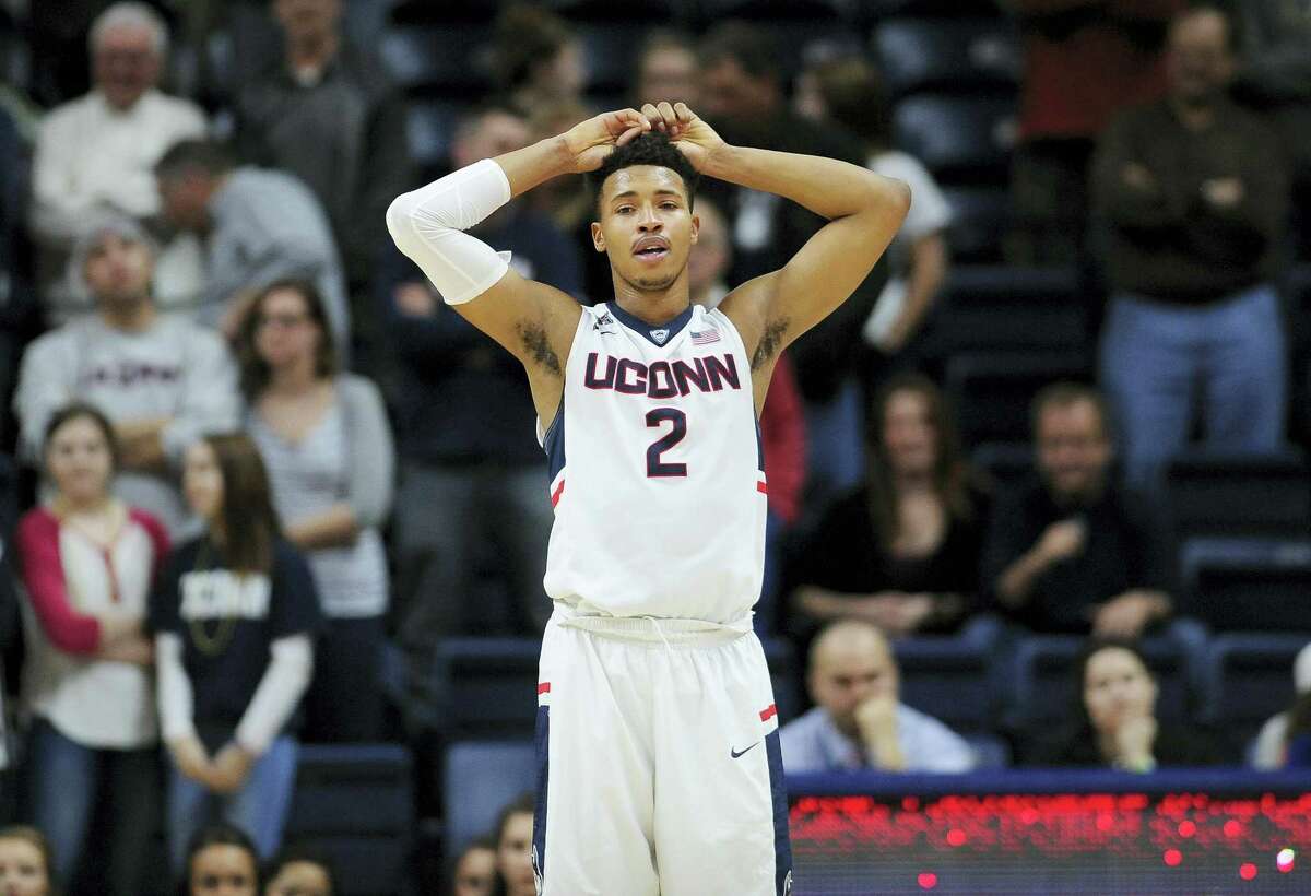 Connecticut's Jalen Adams reacts in the final seconds of the second half of an NCAA college basketball game against Houston, Sunday, Feb. 28, 2016, in Storrs, Conn. Houston won 75-68. (AP Photo/Jessica Hill)