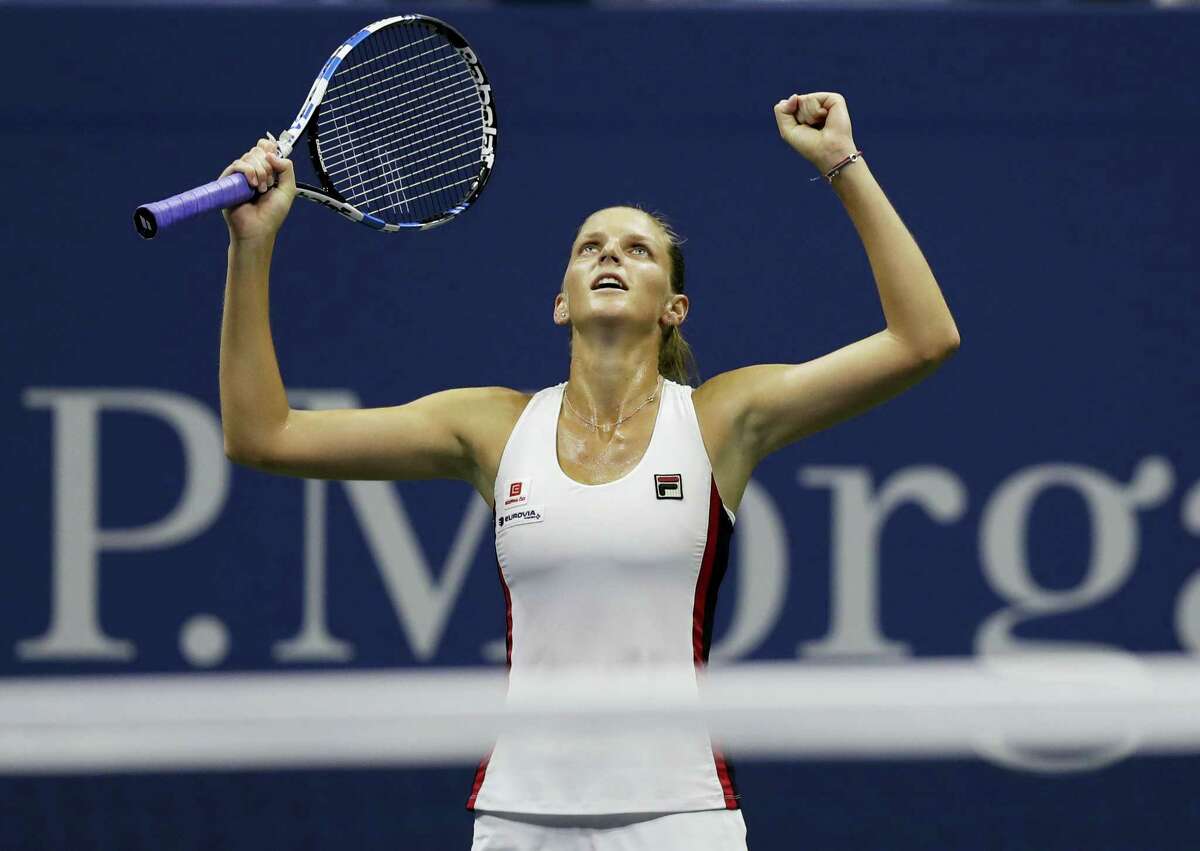 Karolina Pliskova reacts after beating Serena Williams in their semifinal match.