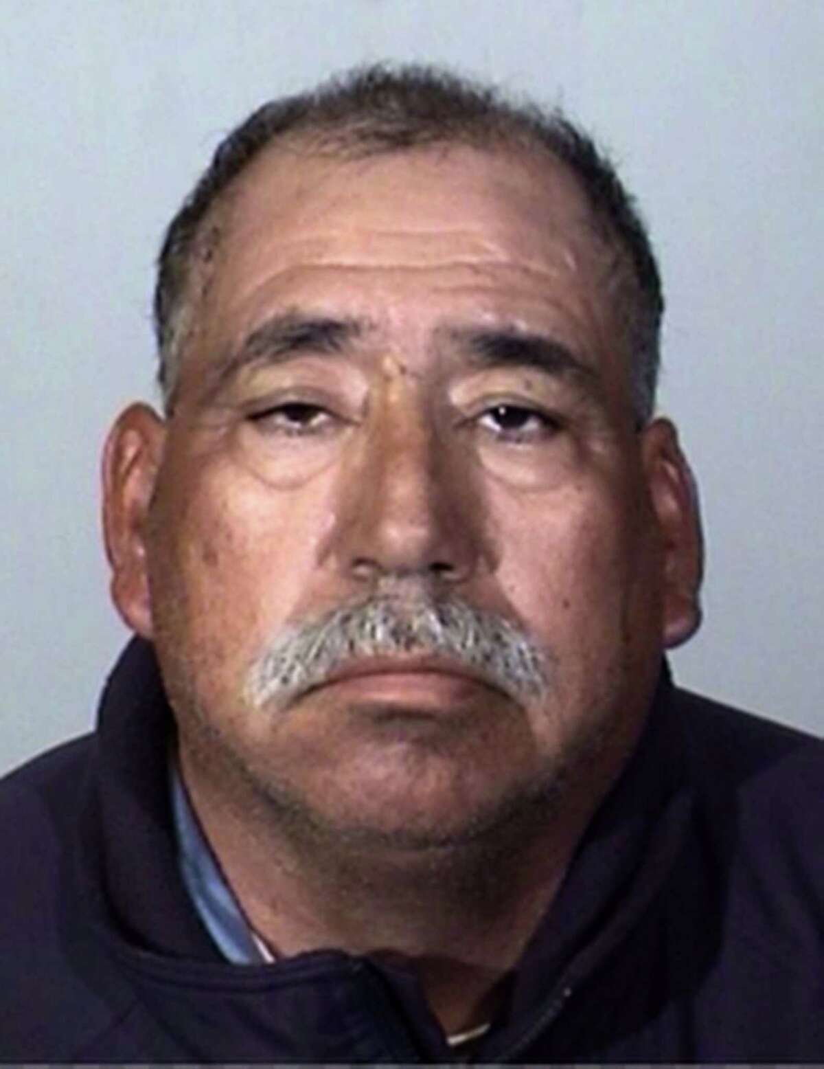 This Tuesday, Feb. 24, 2015 booking photo provided by the Oxnard Police Department shows Jose Alejandro Sanchez-Ramirez, 54, of Yuma, Arizona, who was the driver of a pickup truck that a Southern California commuter train smashed into on Tuesday, Feb. 24, 2015. He was found about a half-mile away from the crash 45 minutes later, said Jason Benites, an assistant chief of the Oxnard Police Department. Sanchez-Ramirez was briefly hospitalized before being arrested Tuesday afternoon on suspicion of felony hit-and-run. (AP Photo/Oxnard Police Department)