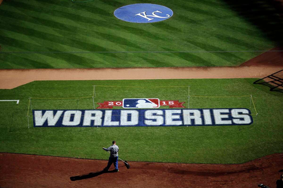 A worker gets Kauffman Stadium ready for the World Series Monday in Kansas City, Mo.