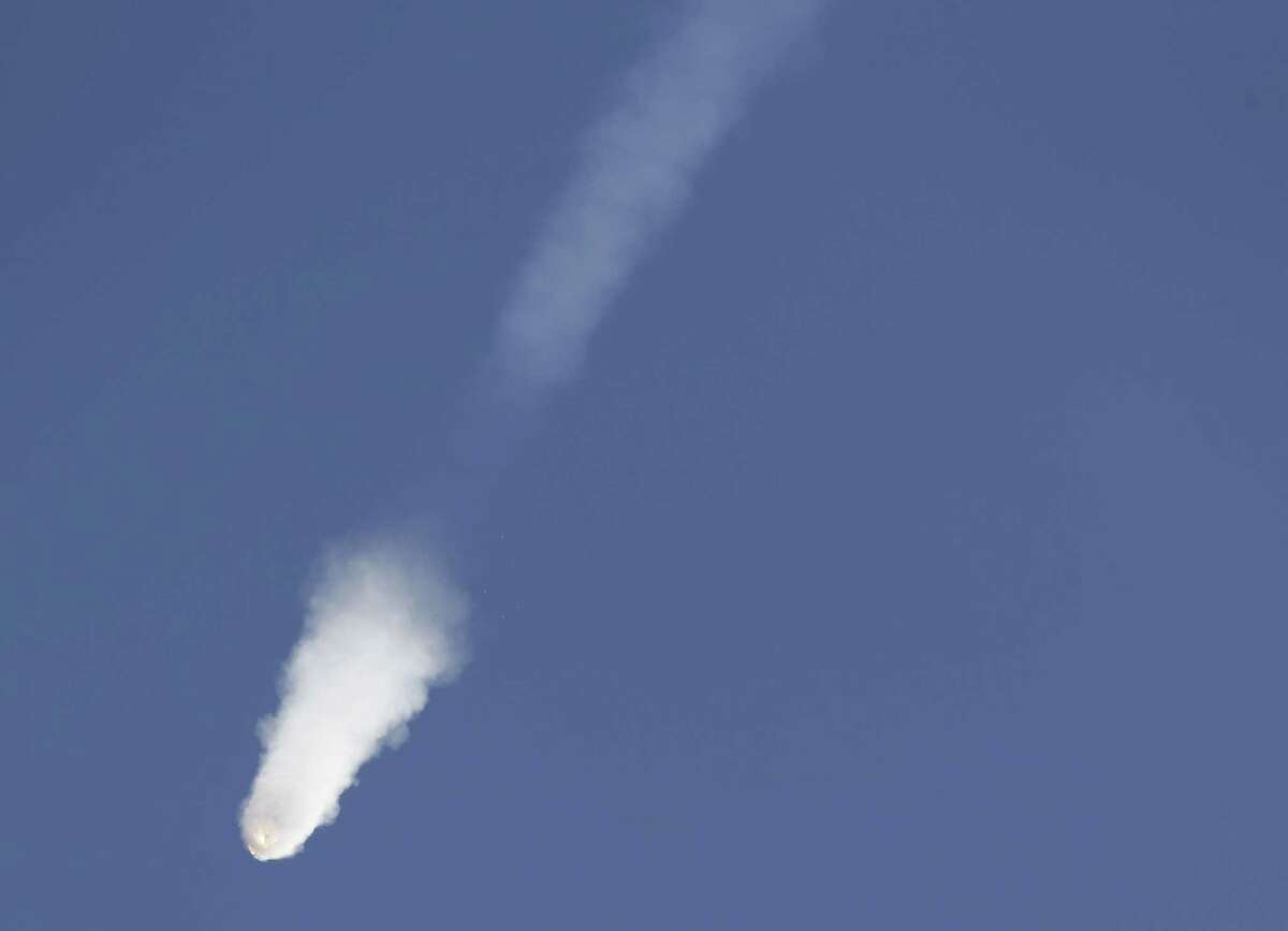 The SpaceX Falcon 9 rocket and Dragon spacecraft breaks apart shortly after liftoff from the Cape Canaveral Air Force Station in Cape Canaveral, Fla., Sunday, June 28, 2015. The rocket was carrying supplies to the International Space Station.