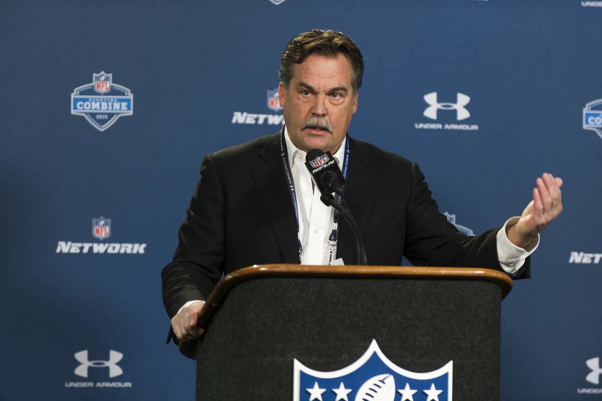 St. Louis Rams head coach Jeff Fisher talks with reporters during a news conference at the NFL scouting combine in Indianapolis on Friday.