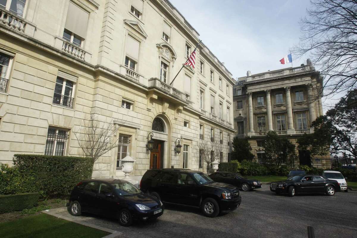 FILE -- This March 18, 2010 file photo shows the main entrance of the American embassy in Paris. At least five drones flew over the Eiffel Tower, the U.S. Embassy and other Paris landmarks overnight, authorities said Tuesday Feb. 24, 2015, in the most audacious of several mysterious drone overflights around France in recent months. (AP Photo/Michel Euler, File)