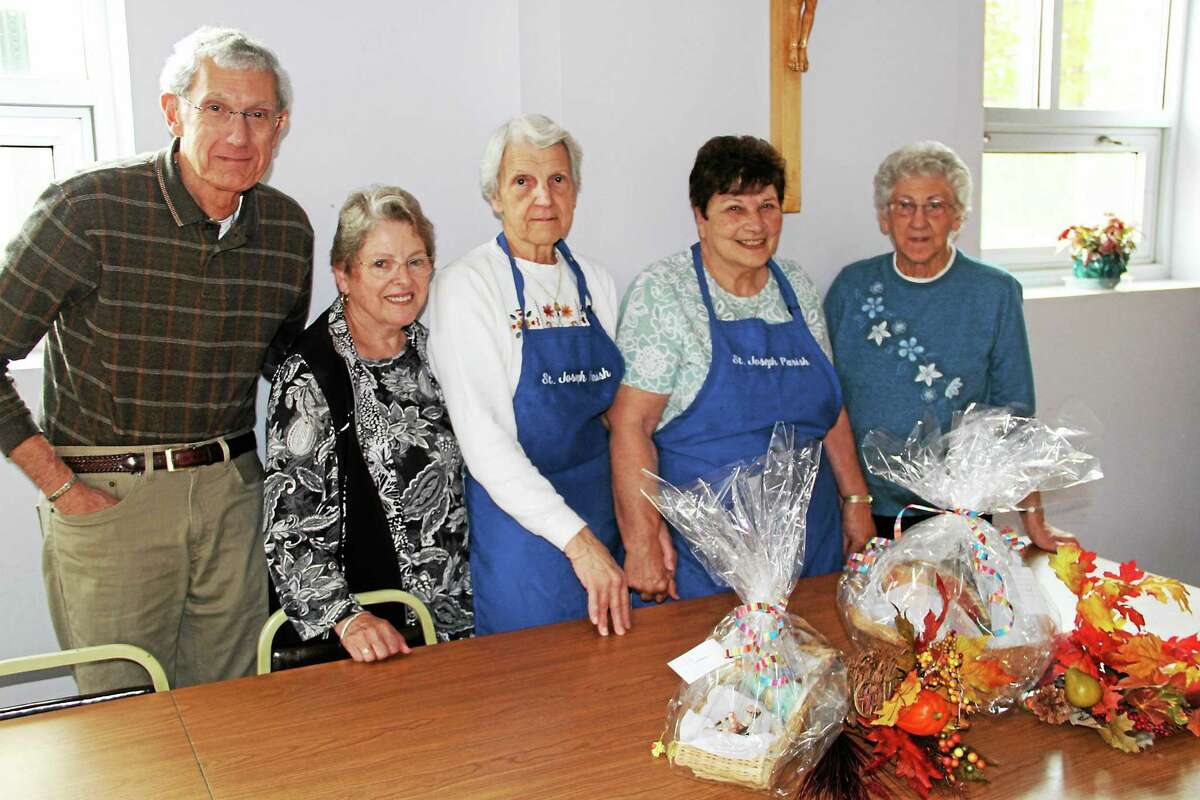 From left, Vinnie and Linda DiBerardino, Frances Dauschere, Ann Brochu and Marguerite Zaccarra are part of the committee that organizes luncheons for senior citizens through St. Joseph Church.