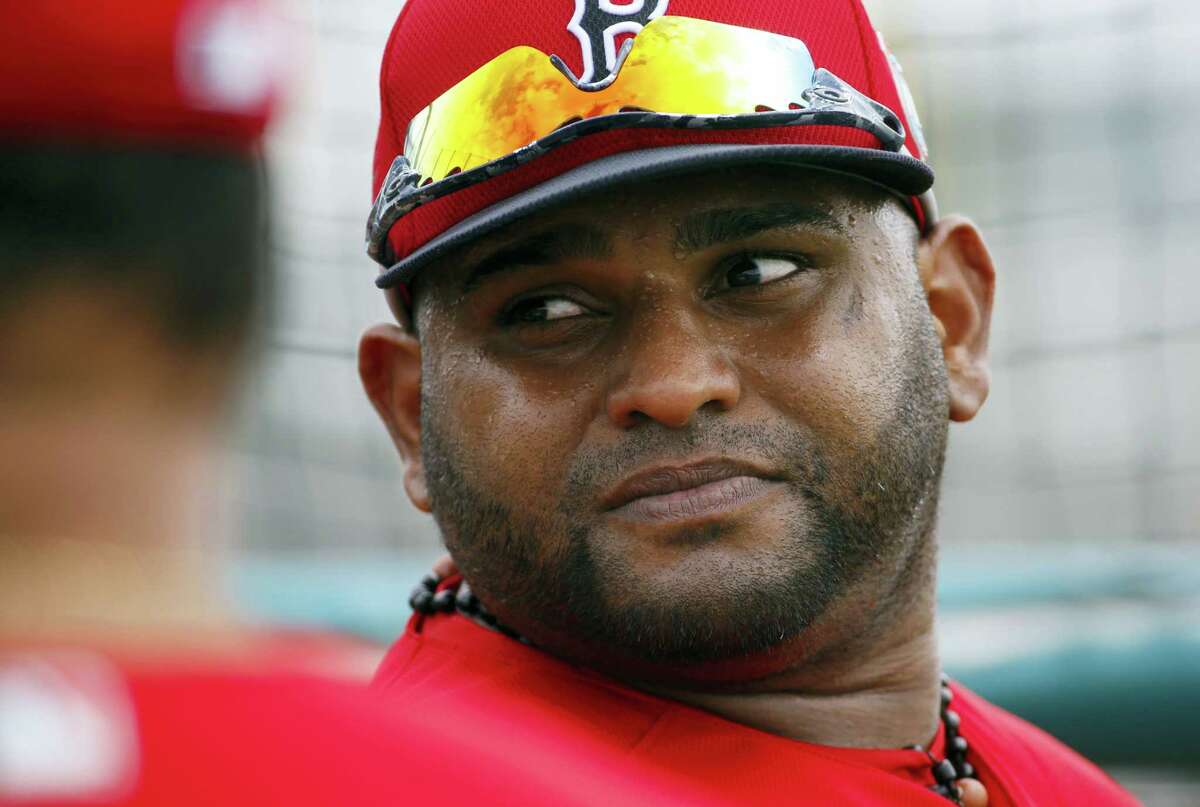 In this Feb. 24, 2016, file photo, Boston Red Sox’s Pablo Sandoval waits to take batting practice during a spring training baseball workout in Fort Myers, Fla.