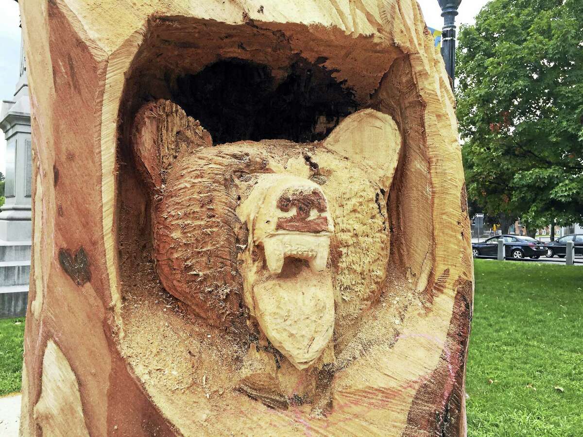 Ben Lambert - The Register Citizen A bear carved by Jared Welcome of JareBear Carvingsin East End Park in Winsted.