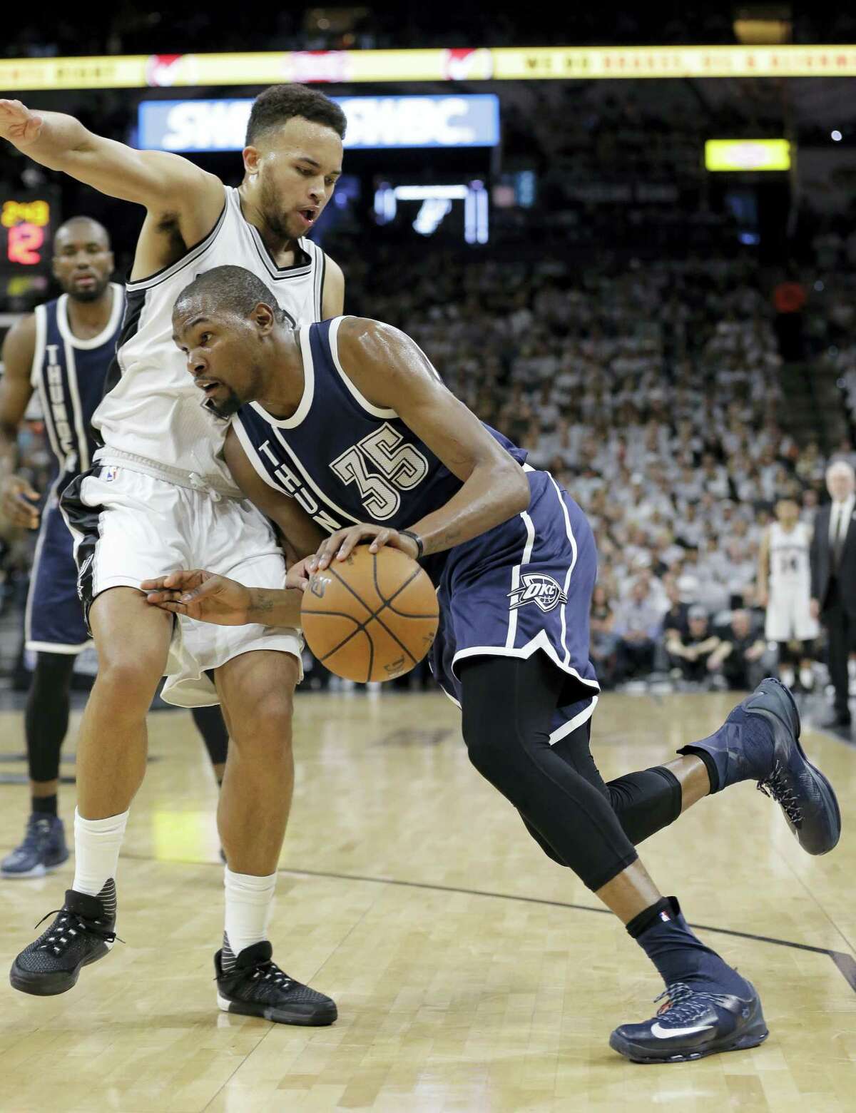Oklahoma City Thunder forward Kevin Durant (35) drives around San Antonio Spurs forward Kyle Anderson (1) during the first half in Game 1 of a second-round NBA basketball playoff series on April 30, 2016 in San Antonio.
